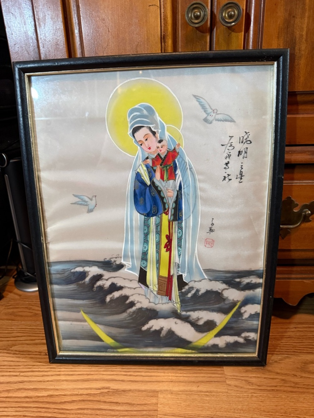 Japanese or Chinese artwork depicts the Madonna and Child painted on silk panel